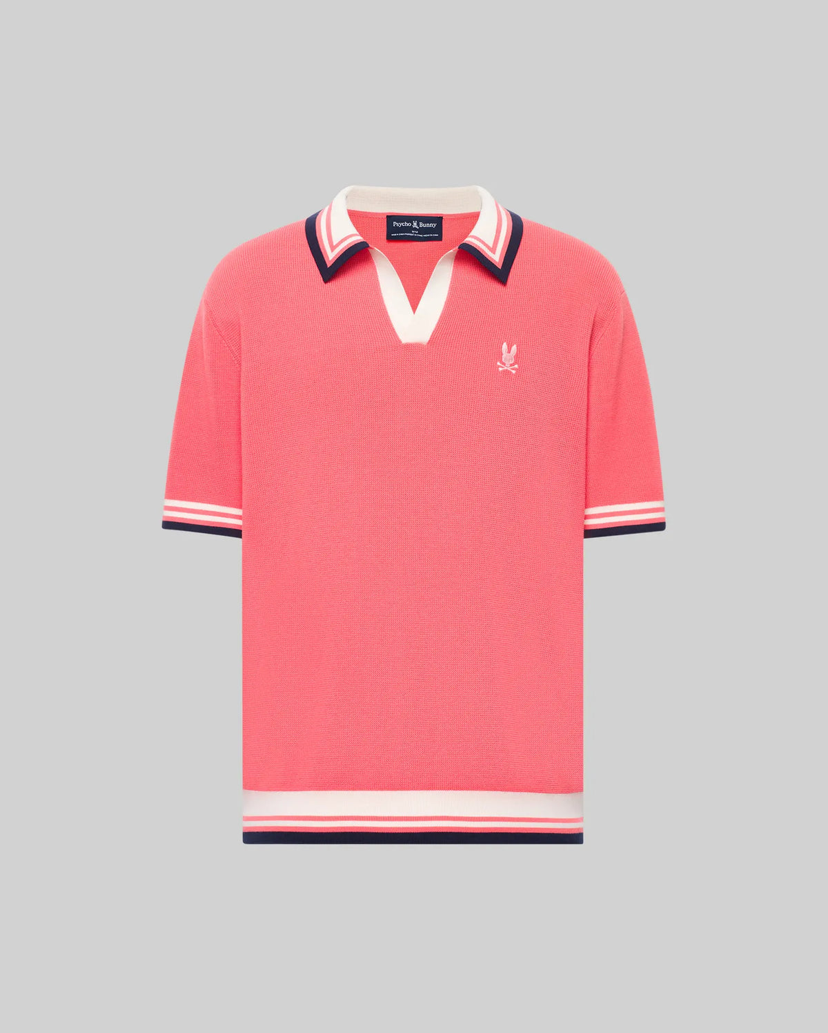 The Psycho Bunny MENS CARTER SWEATER POLO (MT0400093) is a regular fit, short-sleeved pink cotton knit polo with a Johnny collar, striped trim in white, navy, and burgundy, and a white embroidered logo on the left chest.